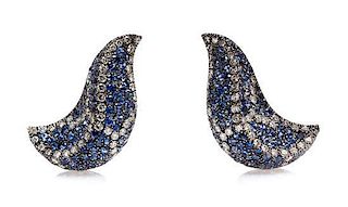 A Pair of 18 Karat White Gold, Sapphire and Diamond Earclips, 20.60 dwts.