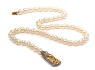 An 18 Karat Two Tone Gold, Cultured South Sea Pearl and Diamond Necklace, 6.20 dwts. (brooch only)