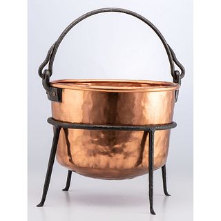 A Copper Apple Butter Kettle on Stand