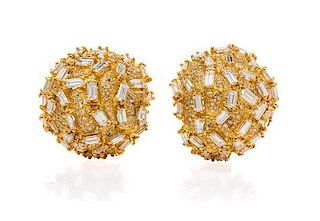 A Pair of 14 Karat Yellow Gold and Diamond Bombe Earclips, 20.40 dwts.