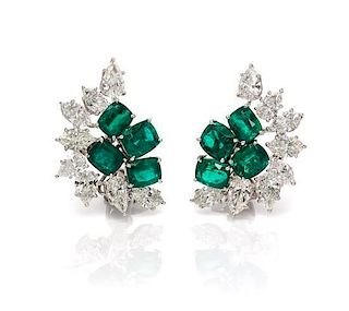 A Pair of Platinum, Emerald and Diamond Earclips, 10.40 dwts.