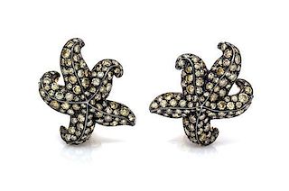 A Pair of 18 Karat Gold, Silver and Colored Diamond Earclips, Gioia, 8.50 dwts.