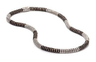 An 18 Karat White Gold, Colored Diamond and Diamond Necklace, 41.50 dwts.