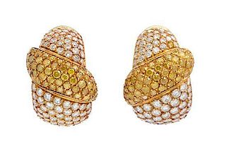 A Pair of 18 Karat Yellow Gold, Colored Diamond and Diamond Earclips, 13.80 dwts.
