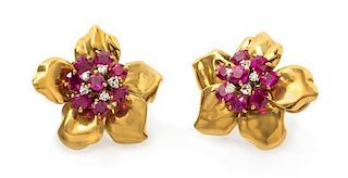 A Pair of 18 Karat Yellow Gold, Ruby and Diamond Earclips, Cartier London, 7.20 dwts.