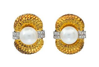 A Pair of 14 Karat Gold, Cultured Pearl and Diamond Earclips, 16.90 dwts.
