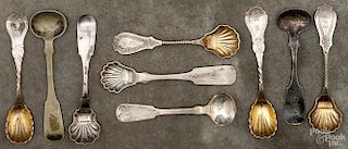 Nine coin silver tea caddy spoons of various makers, 2.3 ozt.