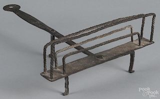 Wrought iron toaster, 19th c., 5 1/2'' h., 15'' w.