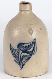 New York stoneware jug, 19th c., impressed Whites Utica, with cobalt flower decoration, 11 1/4'' h.