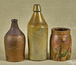 Stoneware bottle, impressed Geo Weller, 10 3/4'' h., together with an unmarked bottle, 8'' h.