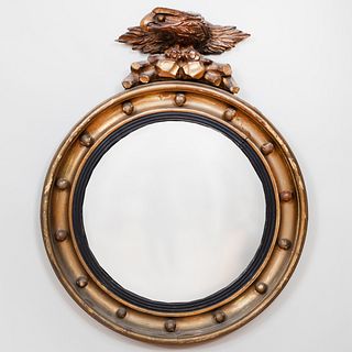 Regency Style Giltwood and Ebonized Convex Mirror