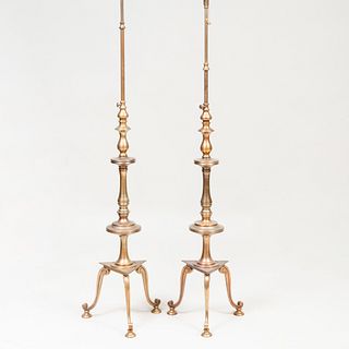 Two Retractable Brass Floor Lamps and Two Brass Shades