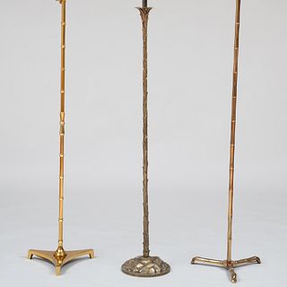 Two Brass Faux Bamboo Floor Lamps and a Bronze Faux Palm Frond Floor Lamp