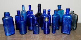 Miscellaneous - 14 cobalt glass bottles