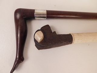 2 ANTIQUE CANES: LADY'S LEG & JOINTED DOG  HEAD