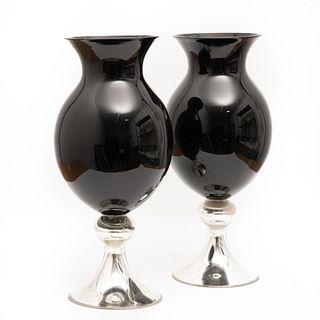 A pair of opaque / mirrored black glass vases