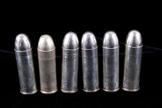 Six .45 Winchester Long Colt Silver Bullets