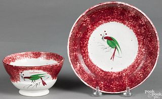 Red spatter cup and saucer with parrot