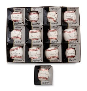A Group of 13 Ernie Banks Signed Baseballs,