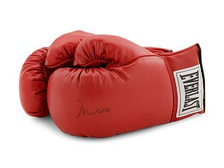 A Pair of Muhammad Ali Boxing Gloves (One Signed),