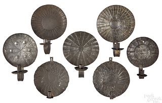 Seven assorted tin sconces, 19th/early 20th c.