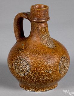 German Bellarmine stoneware jug, 17th c.