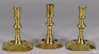 Three Queen Anne brass candlesticks