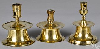 Three Spanish brass capstan candlesticks