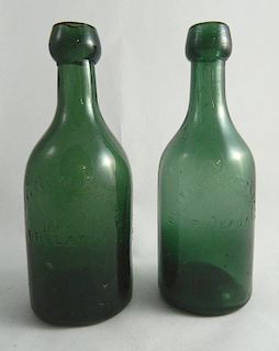 2 Soda round bottles