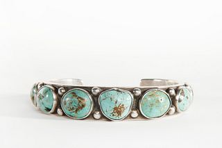 A Navajo Seven Stone Turquoise and Silver Cuff, ca. 1930
