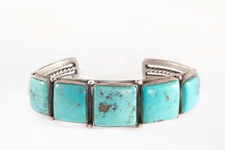 A Navajo Five Stone Turquoise and Silver Cuff, ca. 1940
