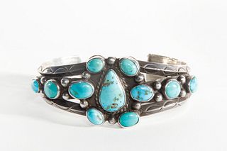 A Navajo Eleven Stone Turquoise and Silver Cuff Bracelet, ca. 1930