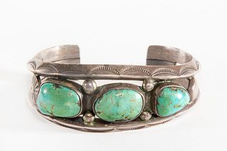 A Navajo Three Stone Turquoise and Silver Cuff Bracelet, ca. 1940