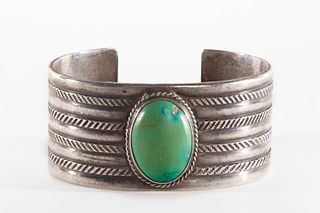 A Navajo Turquoise and Silver Cuff, ca. 1940-1950