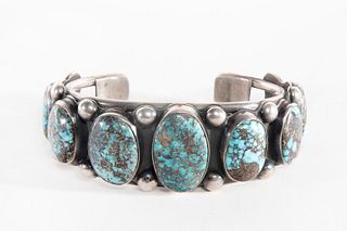 A Navajo Seven Stone Turquoise and Sterling Silver Cuff Bracelet, ca. 1940