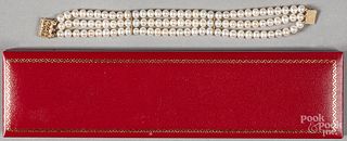 Three strand pearl bracelet with 14K gold clasp