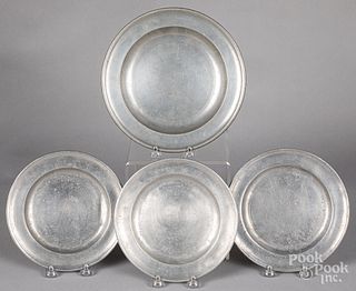 Four pewter plates