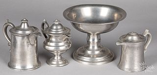 Three pewter syrup pitchers
