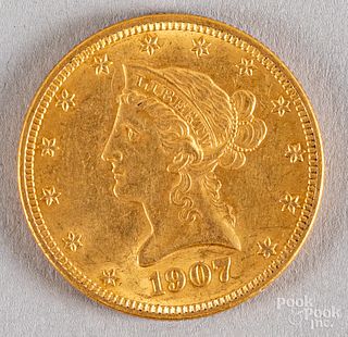 1907 ten dollar Liberty Head gold eagle coin.
