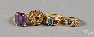 Four 18K gold and gemstone rings