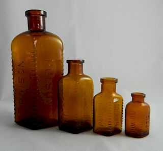4 Amber poison bottles