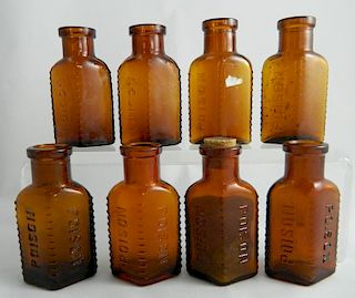 8 Amber poison bottles