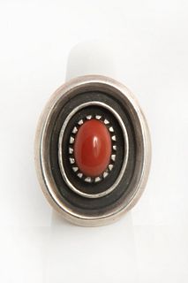 A Coral and Sterling Navajo Silver Ring