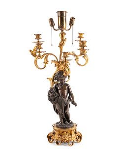 A Louis XV Style Gilt and Patinated Bronze Five-Light Candelabrum