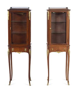 A Near Pair of Louis XV Style Gilt Bronze Mounted Vitrine Cabinets