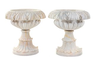 A Pair of Carved Marble Urns