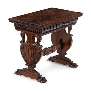 A Renaissance Revival Carved Walnut Low Trestle Table