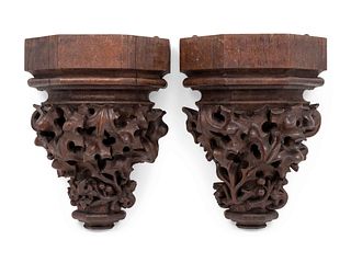 A Pair of Renaissance Revival Carved Oak Wall Brackets