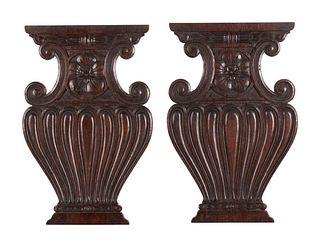 A Pair of Renaissance Revival Carved Walnut Urn-Form Panels