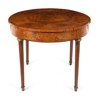 A Continental Marquetry Decorated Center Table